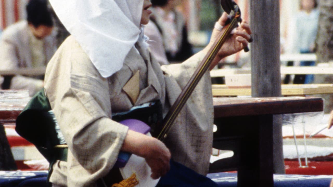 woman singing with shamisen